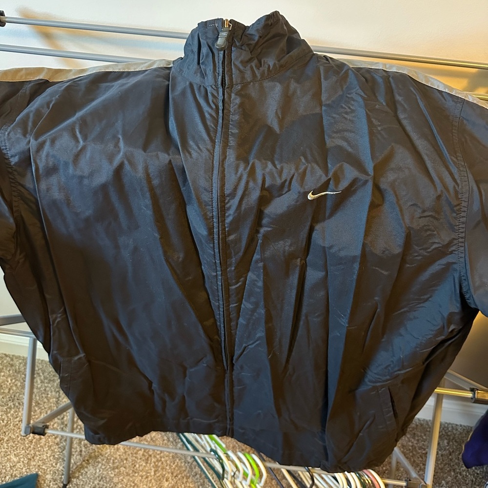 Nike black and grey windbreaker in a men’s size extra extra large.